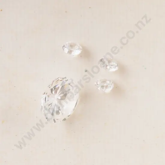 Four Unmounted Imitation Diamonds