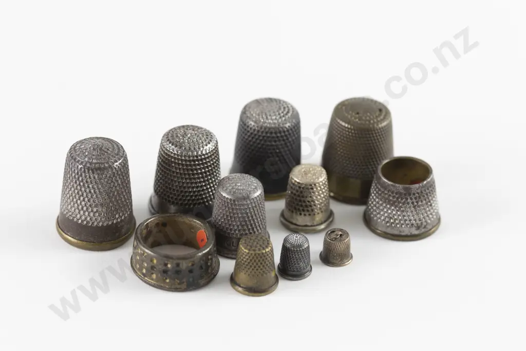 Eleven Antique Metal Family Sewing Box Thimbles including Childs and Two Miniatures Image 1++