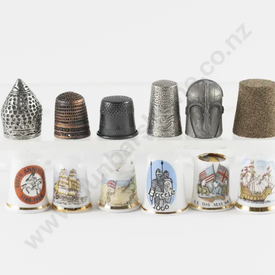 Four Military Theme Thimbles and Eight Historical Thimbles