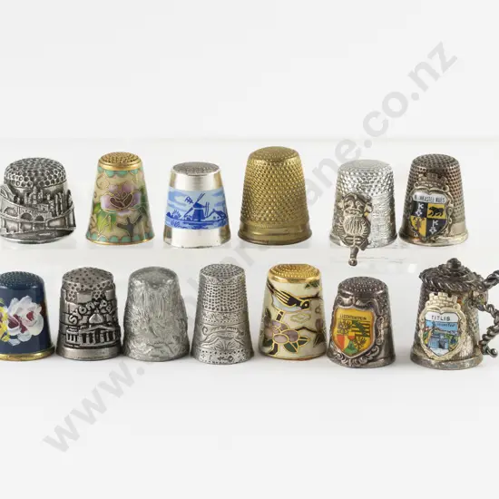 Thirteen Various Metal Thimbles