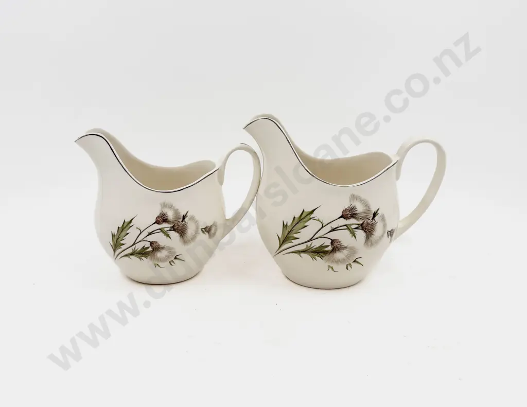 Graduated Pair of Johnson Bros Thistle Pattern Jugs Image 1++