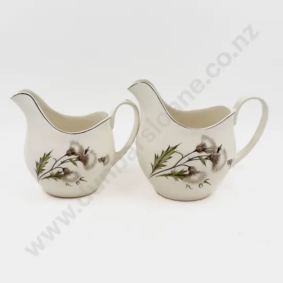 Graduated Pair of Johnson Bros Thistle Pattern Jugs