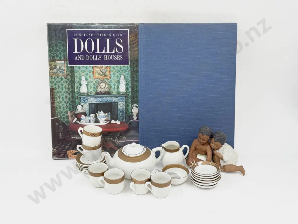 Two Doll Reference Books with Pair of Bisque Piano Babies and Nursery Tea Set Image 1++
