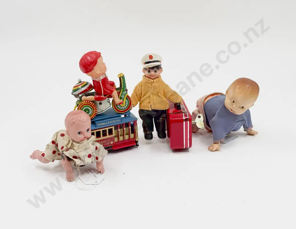 Four Assorted Wind Up Toys and Other Image 1++