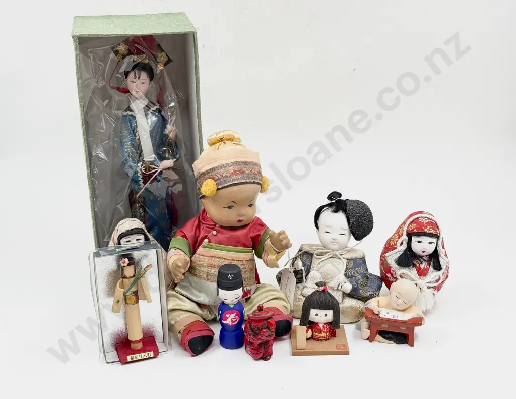 Collection of Asian Dolls and Ornaments Image 1++