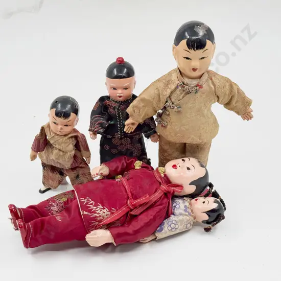 Four Vintage Composition Asian Costume Dolls