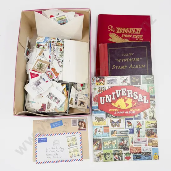 Three Vintage World Stamp Albums with loose unsorted World Stamps