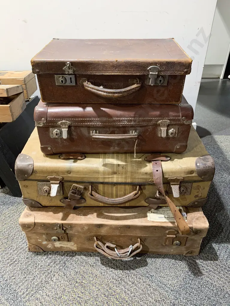 Four Vintage Suitcases Image 1++