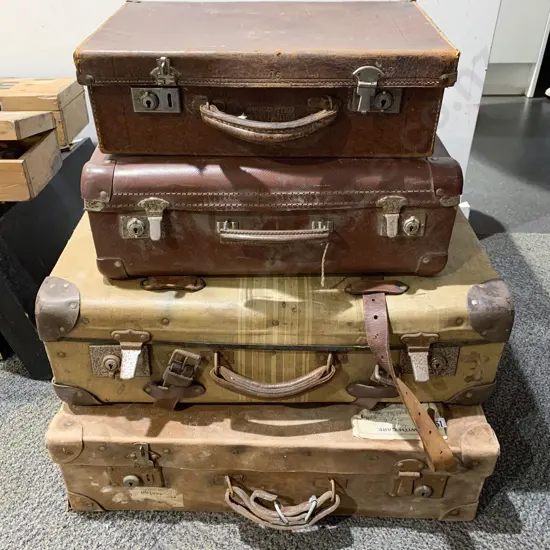 Four Vintage Suitcases