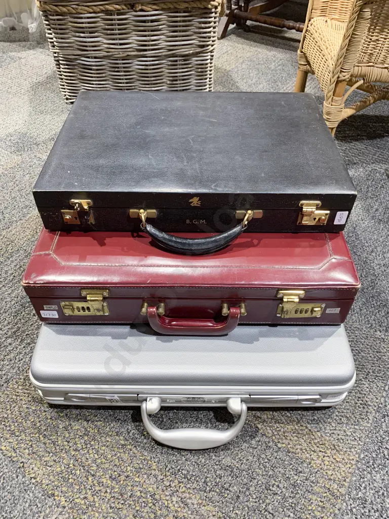 Three Assorted Briefcases Image 1++