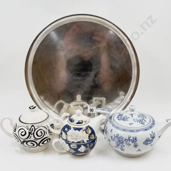 Three Assorted Tea Pots on CircularTray