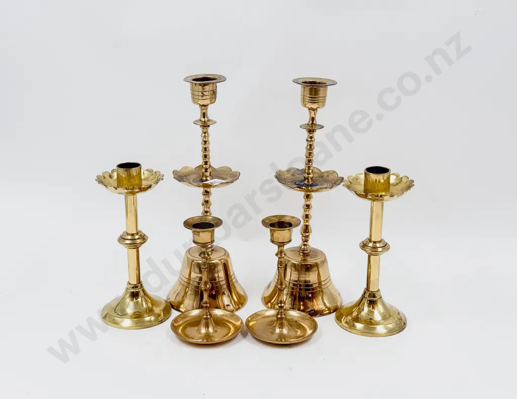Three Pairs of Brass Candlesticks Image 1++