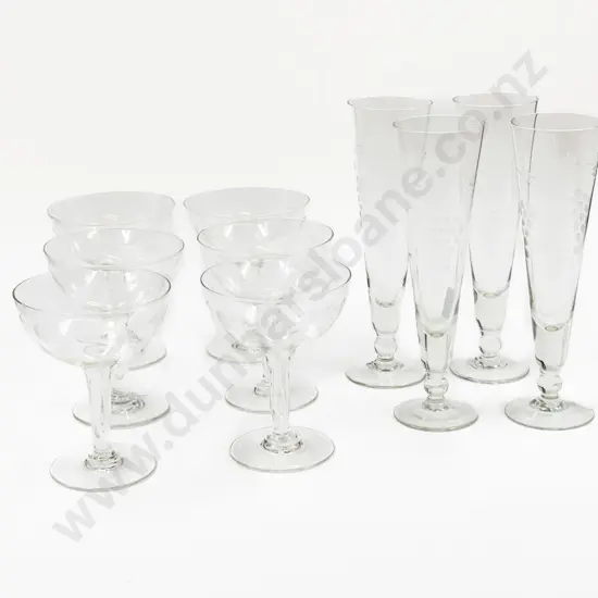 Six Etched Glass Hollow Stemmed Champagne Glasses together with Four Other Glasses