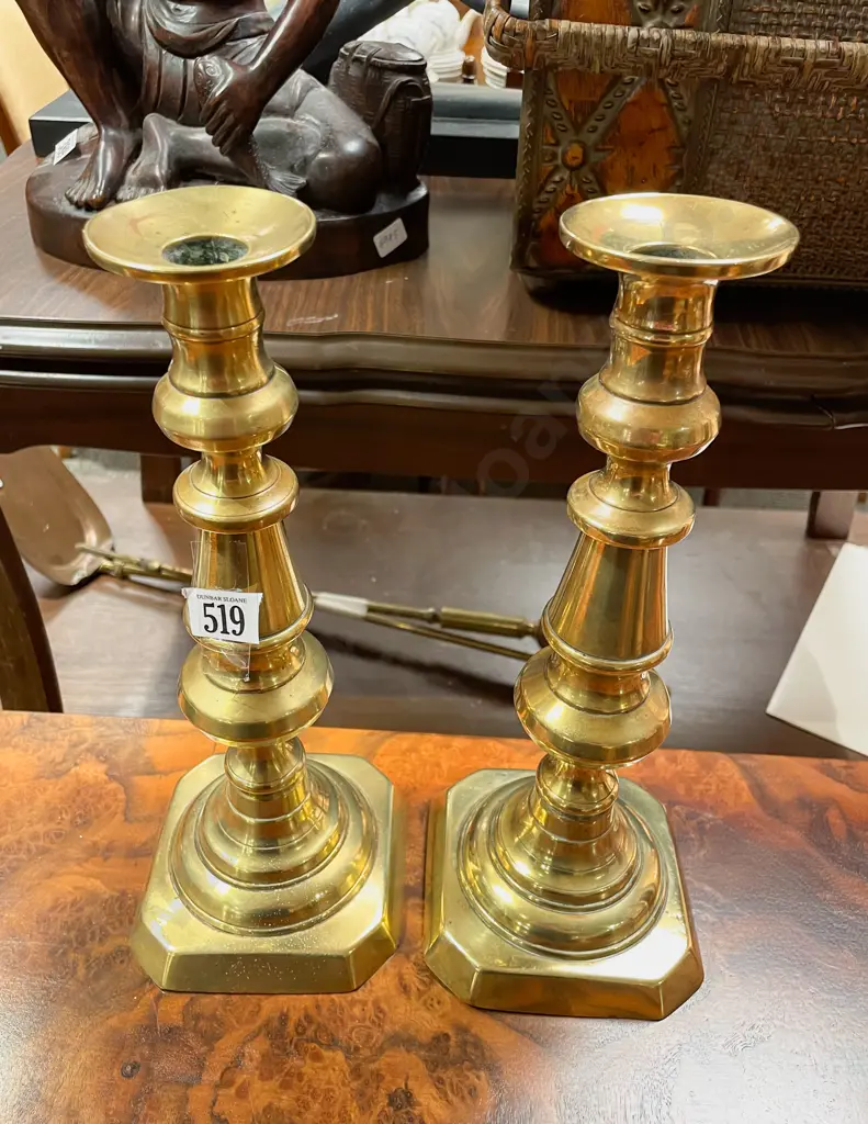 A Pair of Brass Candlesticks Image 1++