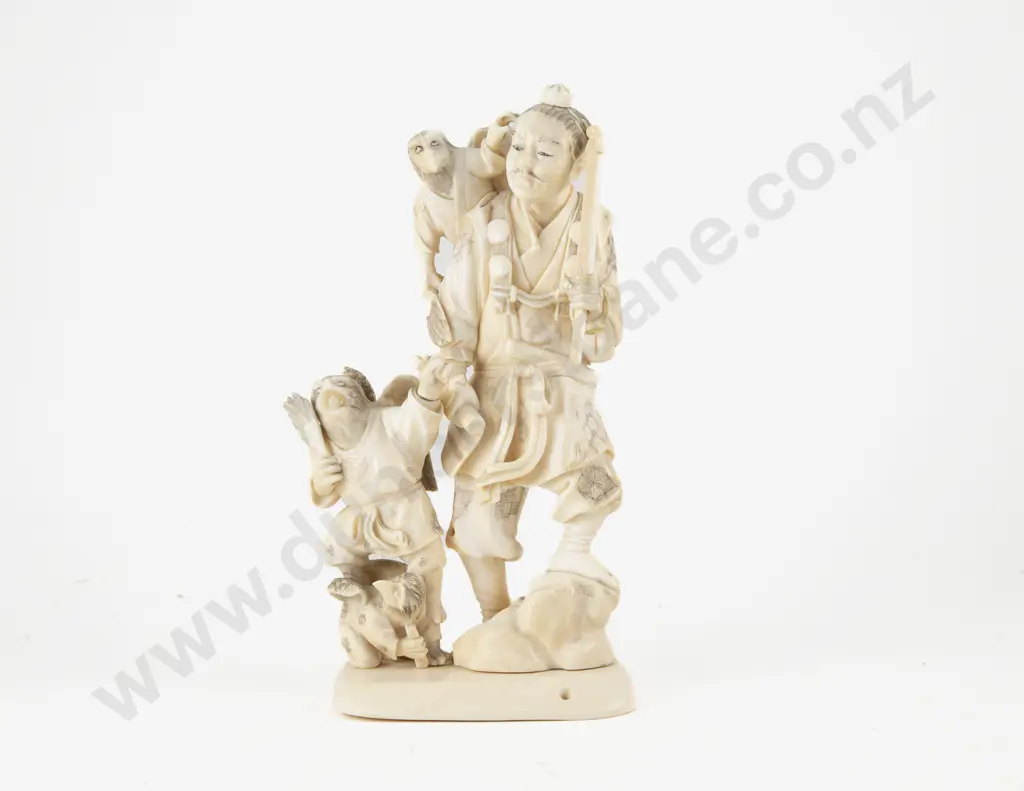 Signed Meiji period (1868–1912) Japanese Ivory Carving of Hunter with Guardian Eagle Attendants Image 1++