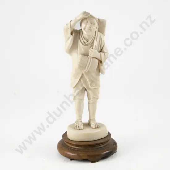 Signed Meiji period (1868–1912) Japanese Ivory Carving of a Traveller