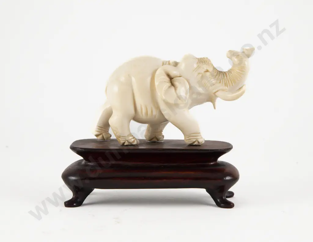 Carved Ivory Elephant on Stand Image 1++