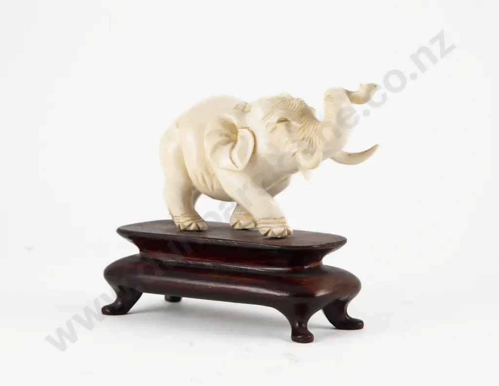 Carved Ivory Elephant on Stand Image 1++