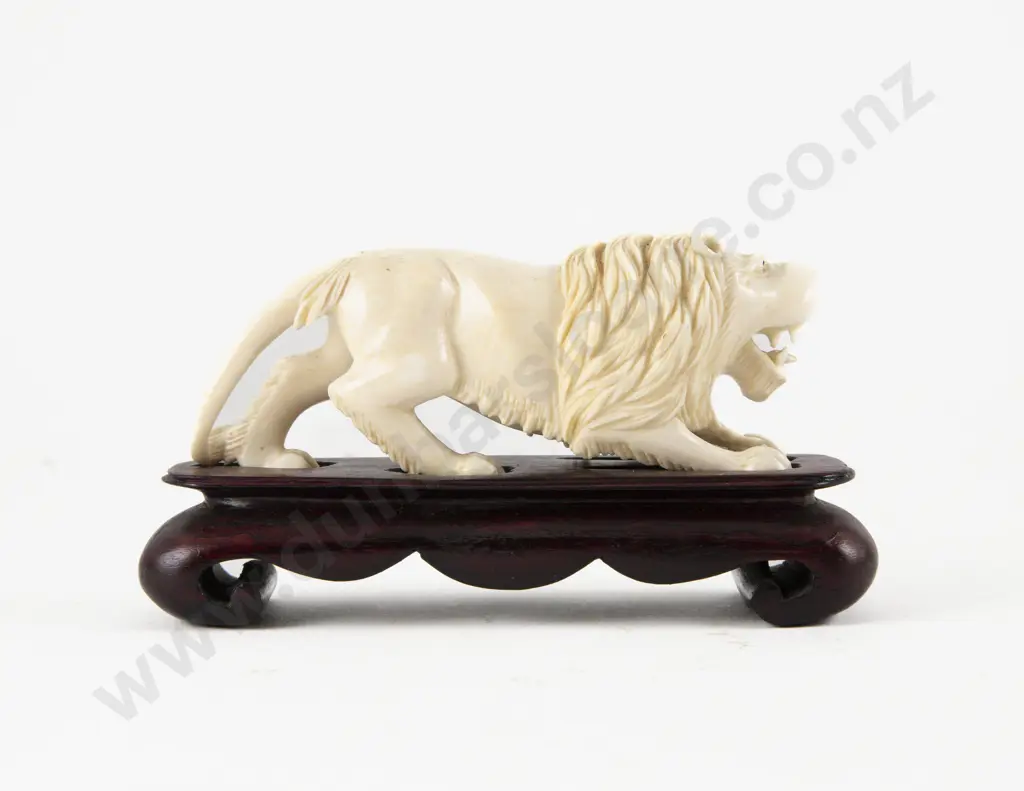 Carved Ivory Lion on Stand Image 1++