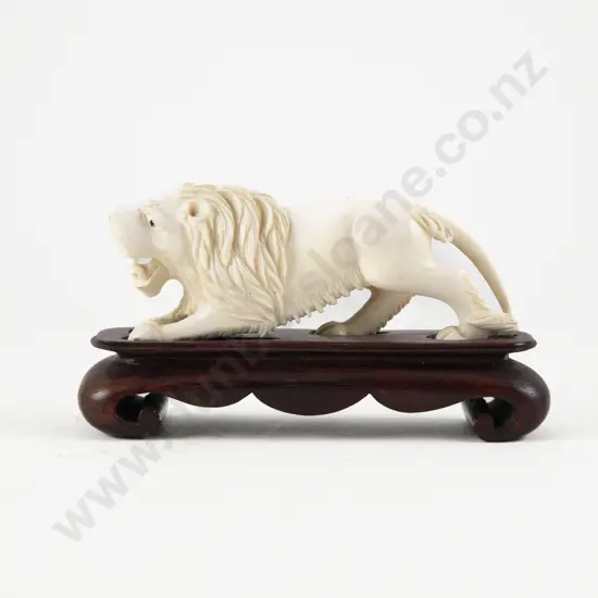 Carved Ivory Lion on Stand