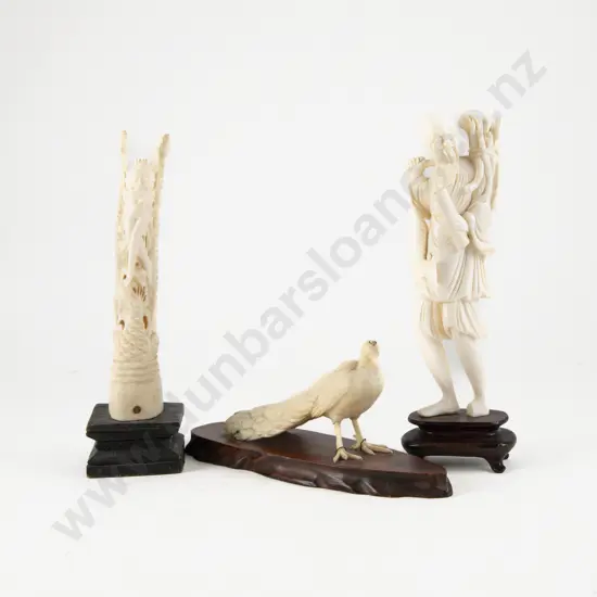 Carved Ivory Figure of a Fisherman with Peacock and Thai Carved Bone Totem Figure