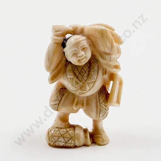 Signed Carved Ivory Netsuke of a Woodsman