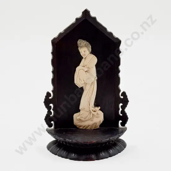 Carved Ivory Immortal on Ebony Throne