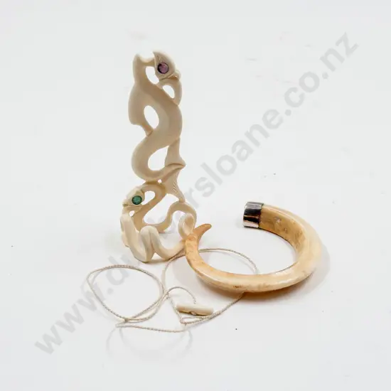 Carved Bone Tiki Ornament (af) with boar tusk