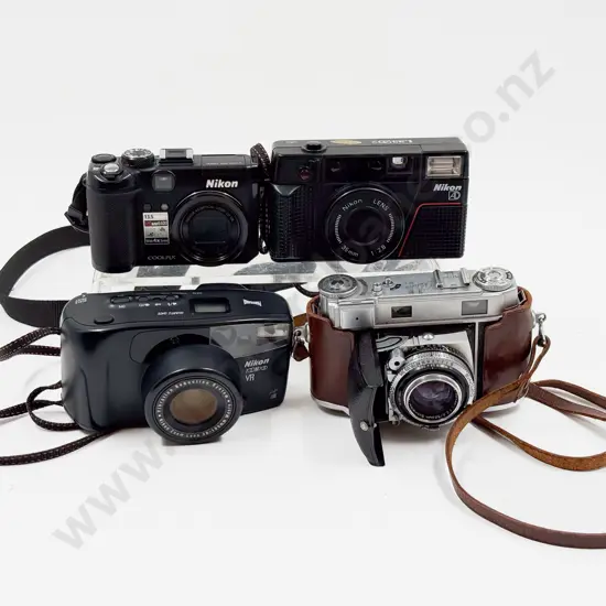 Kodak Retina III and Three Nikon Cameras