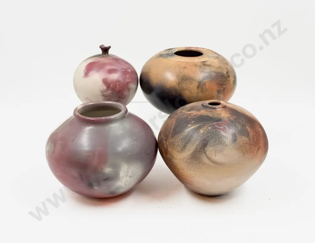 Four Assorted Pottery Vases Image 1++