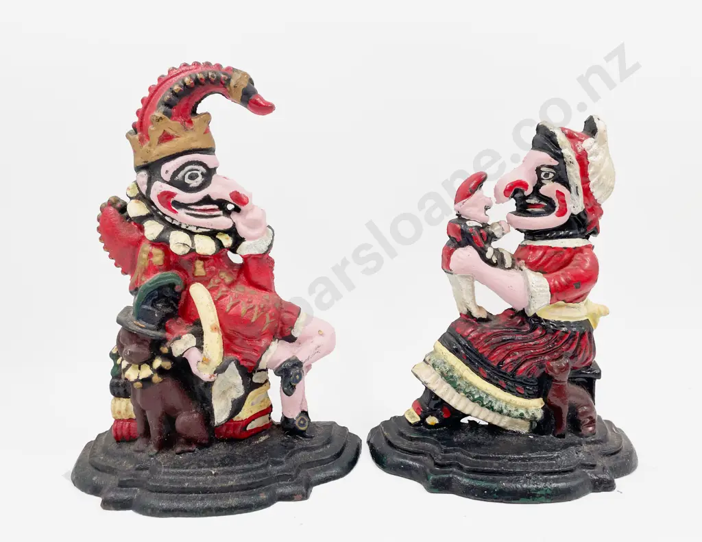 Pair of Punch & Judy Cast Metal Doorstops Image 1++