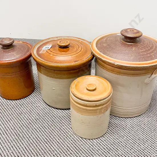 Four Assorted Lidded Stoneware Crocks