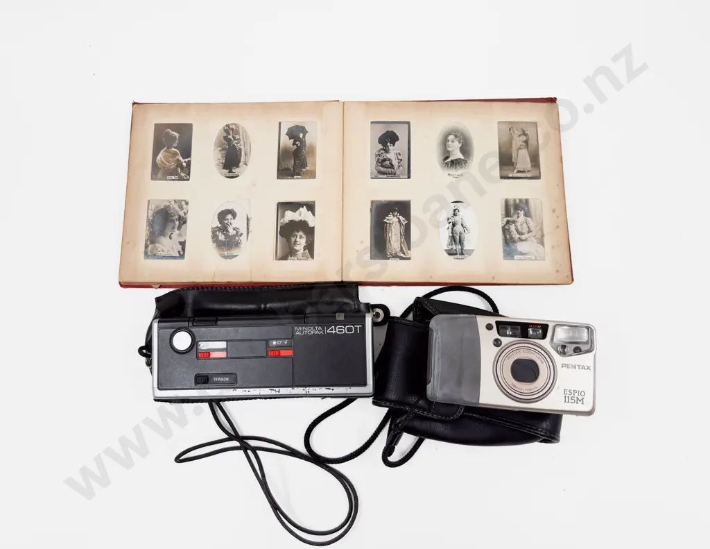 Vintage Cigarette Card Album together with Two Vintage Cameras Image 1++
