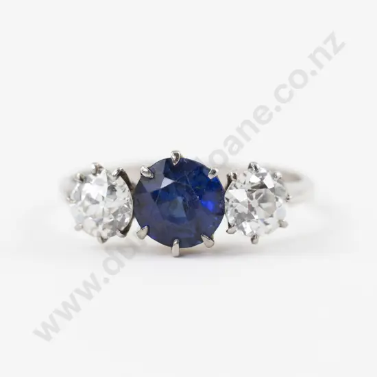 18ct and Platinum Three Stone Sapphire and Diamond Ring