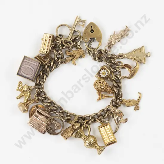 22 9ct 14ct and 18ct Charms on a Curb Link Charm Bracelet