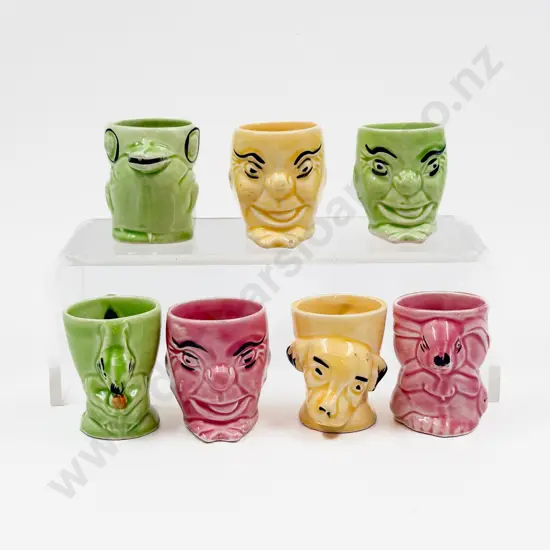 Seven Royal Art Pottery Novelty Egg Cups