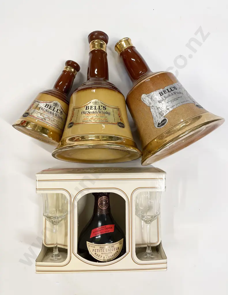 Moet & Chandon Wine Liqueur Gift Pack and Graduated Set of Three Bell's Whiskey Decanters Image 1++