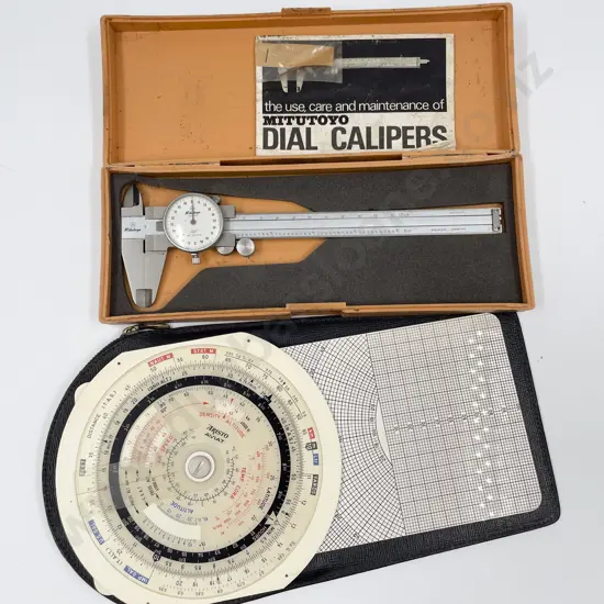 Vintage Flight Computer together with Dial Calipers in Case