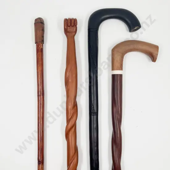 Four Various Carved Walking Sticks