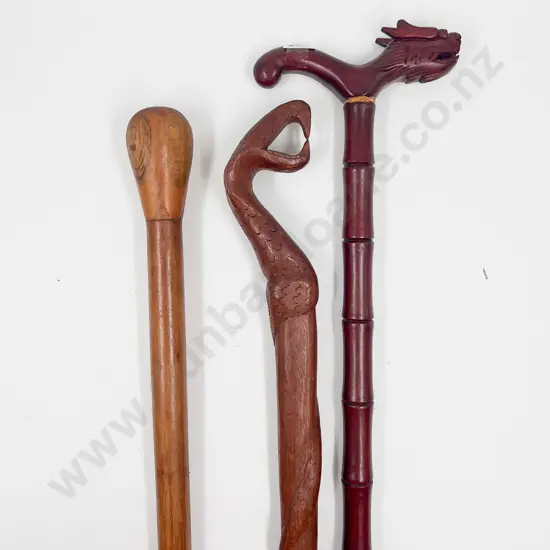 Three Various Carved Walking Sticks