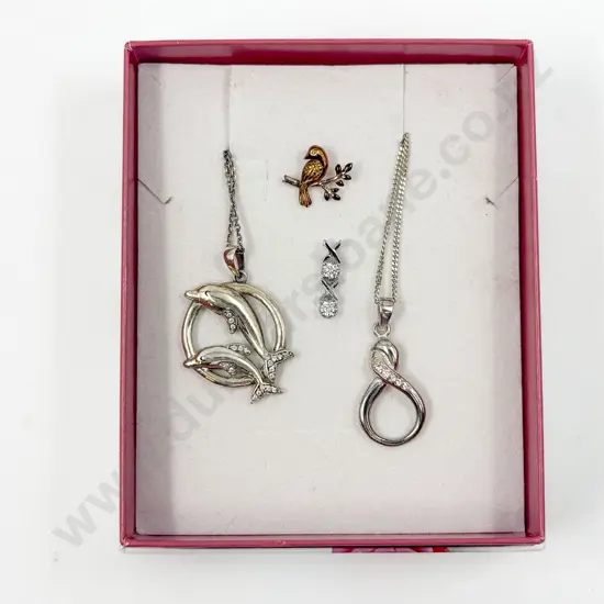 Sterling Silver Circular Dolphin Pendant with Three Other Pendants