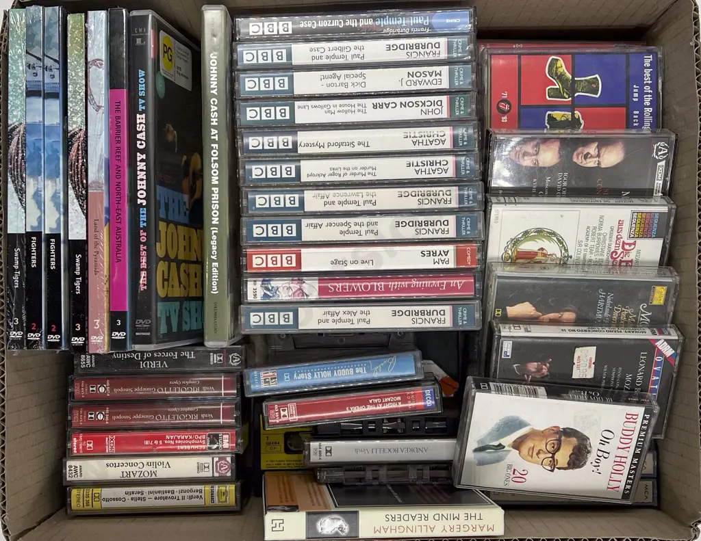 Box of Assorted CDs & DVDs & Tapes Image 1++