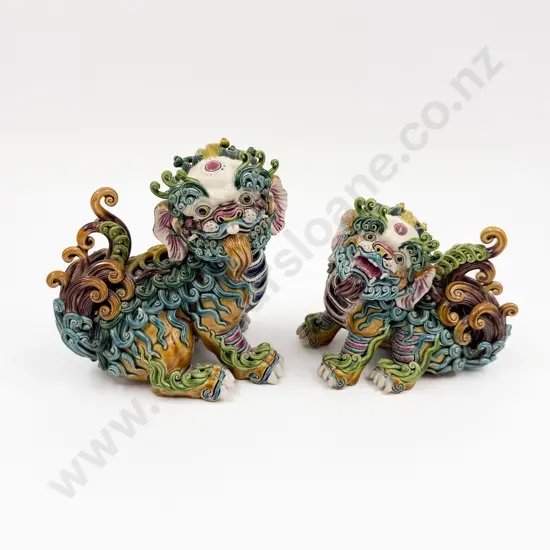 Graduated Pair of Chinese Polychrome Foo Dogs