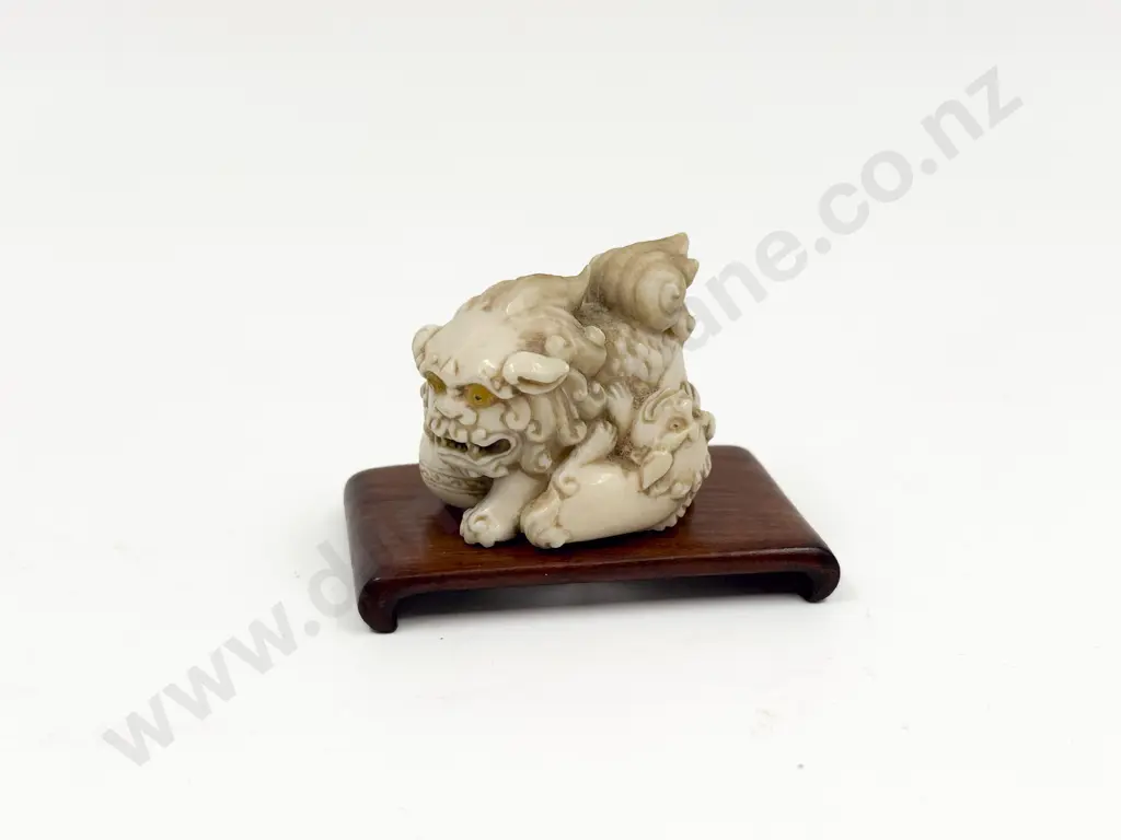 Japanese Ivory Netsuke Form of Three Shishi on Small Stand Image 1++