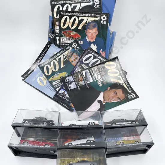 Seven James Bond Car Collection Vehicles & Assorted Magazines