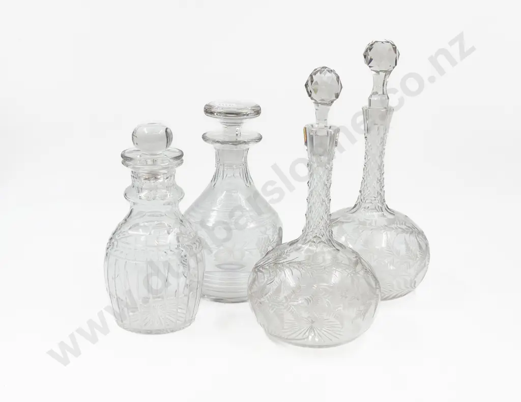 A Pair of Etched Glass Decanters together with Two Crystal Decanters Image 1++