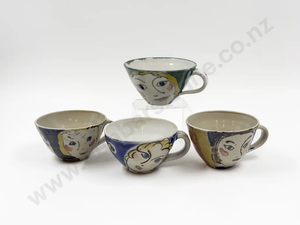 Four Pottery Mugs Image 1++