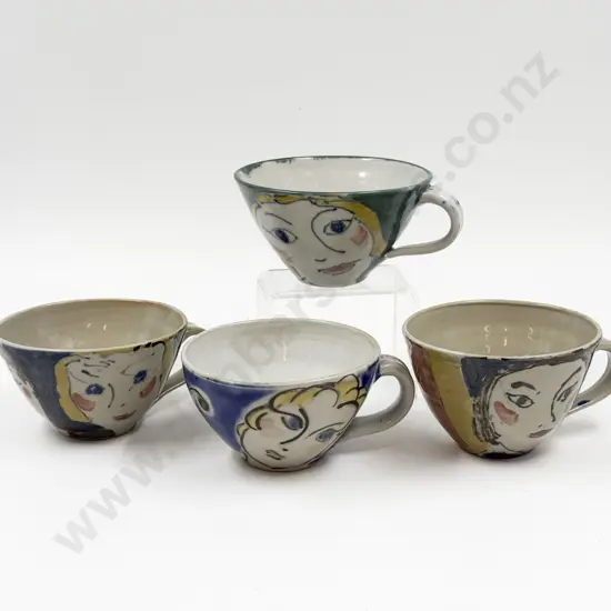 Four Pottery Mugs